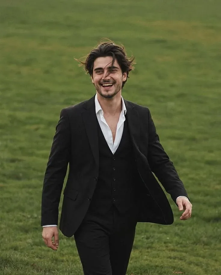 Handsome Young Man, Laughing Joyfully, Wind-blown Hair AI Photo Prompt preview example result