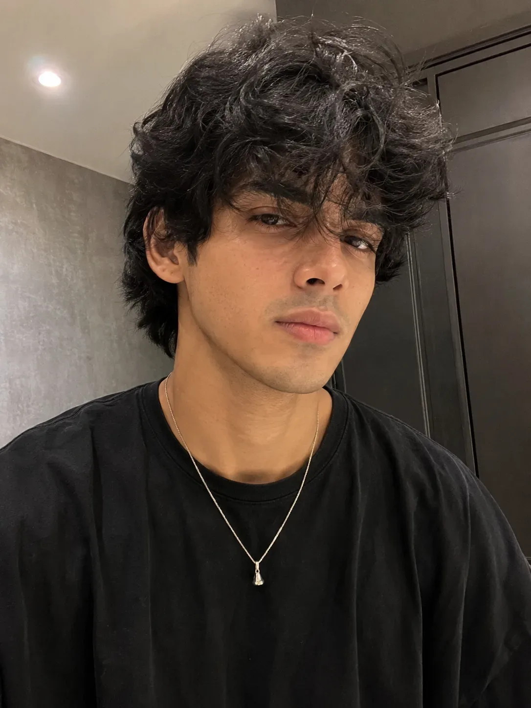 Premium Photorealistic Portrait Messy Hair & Black T-shirt AI Photo Prompt preview example result