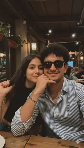 Young Couple's Cozy Patio Moment - copy paste viral AI prompt