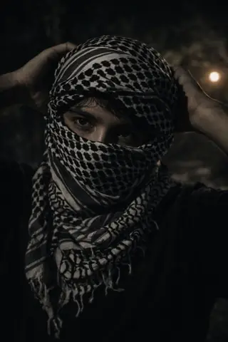 Mysterious boy keffiyeh night portrait gemini prompt - copy paste on Gemini AI