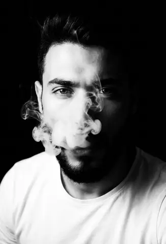 Noir Male Portrait Smoking - copy paste viral AI prompt