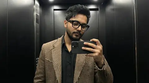 Young Man Elevator Portrait - copy paste viral AI prompt